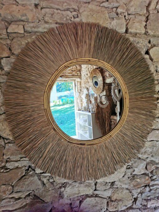 Miroir en paille d'un mètre de diamètre